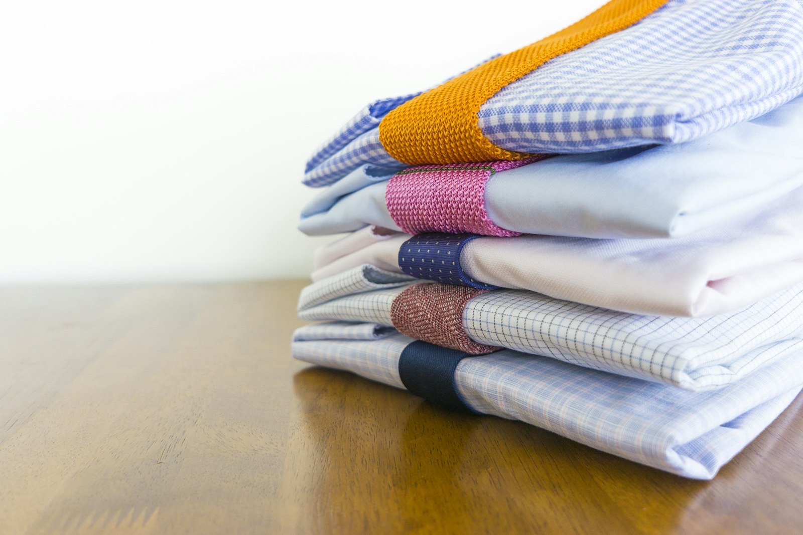Stack of folded shirts in a retail store