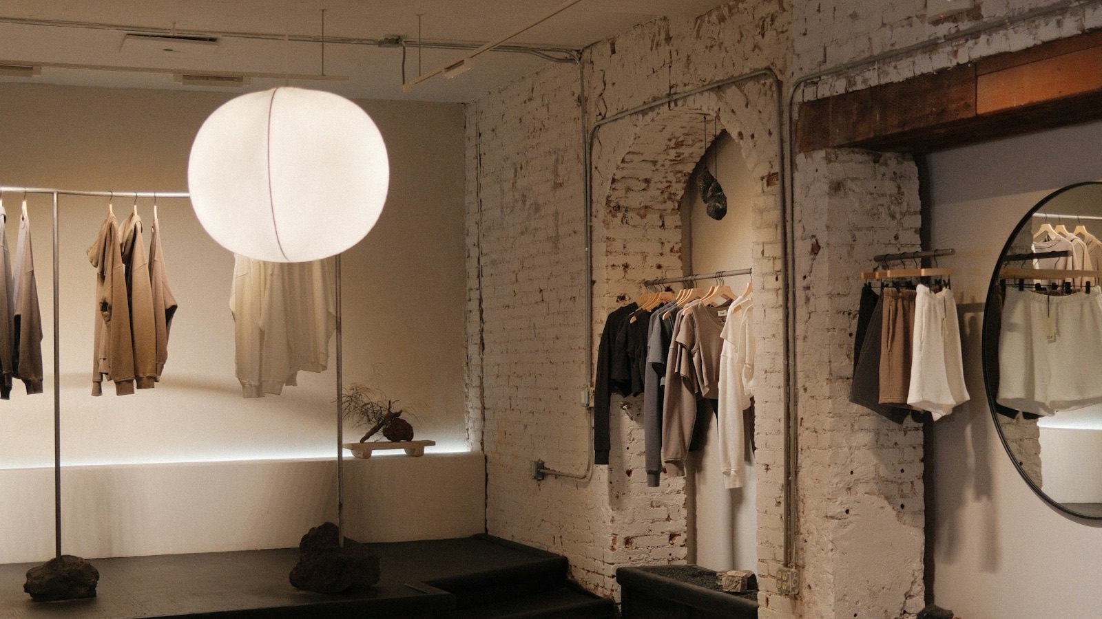 Interior of a boutique clothing store with garments on racks