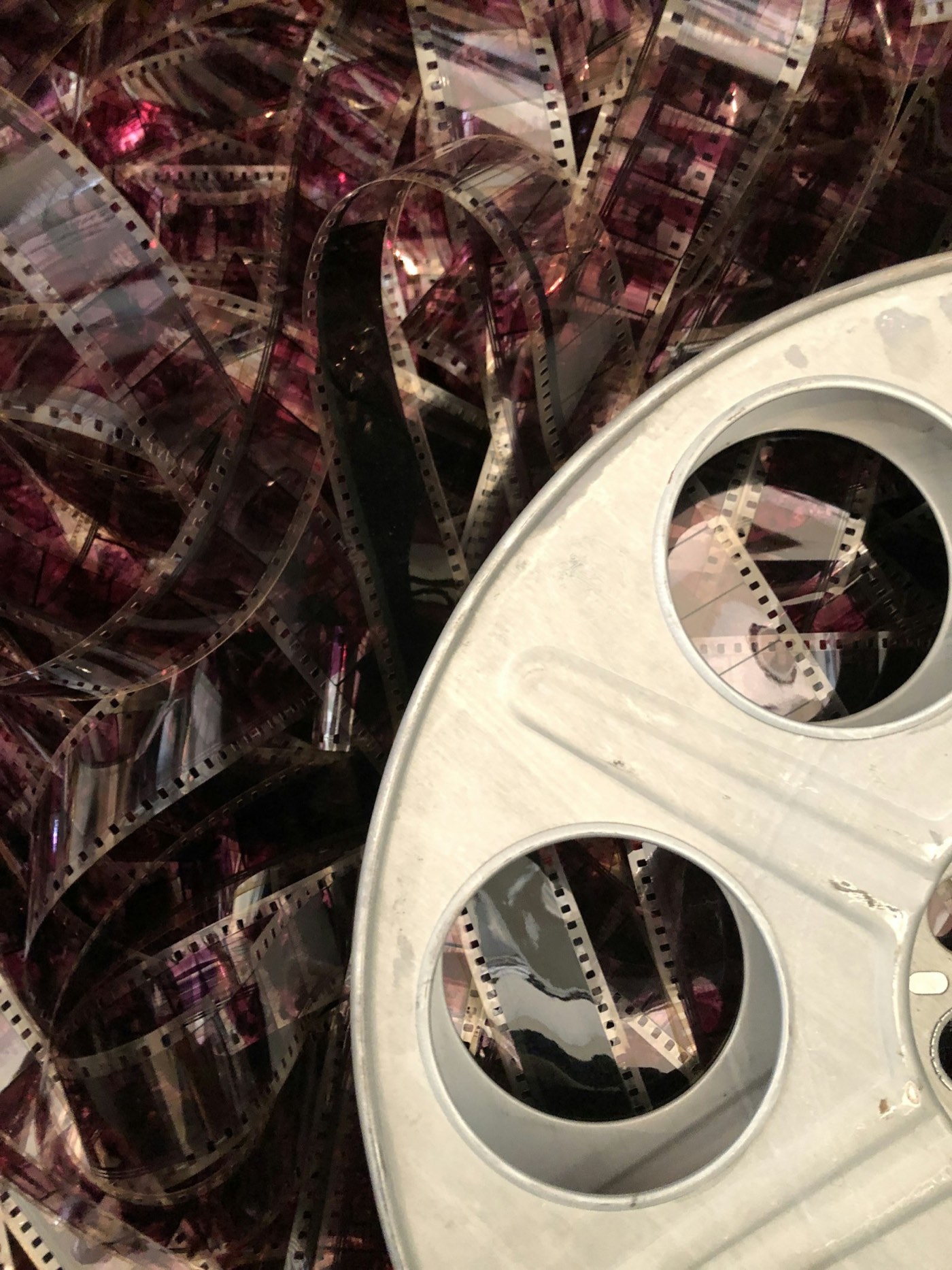 Film reels stacked in a cinema archive