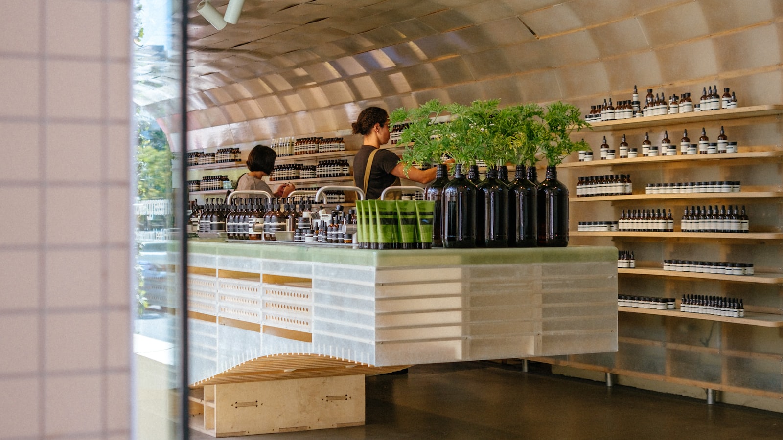 Interior of a modern retail store with a wooden arched ceiling